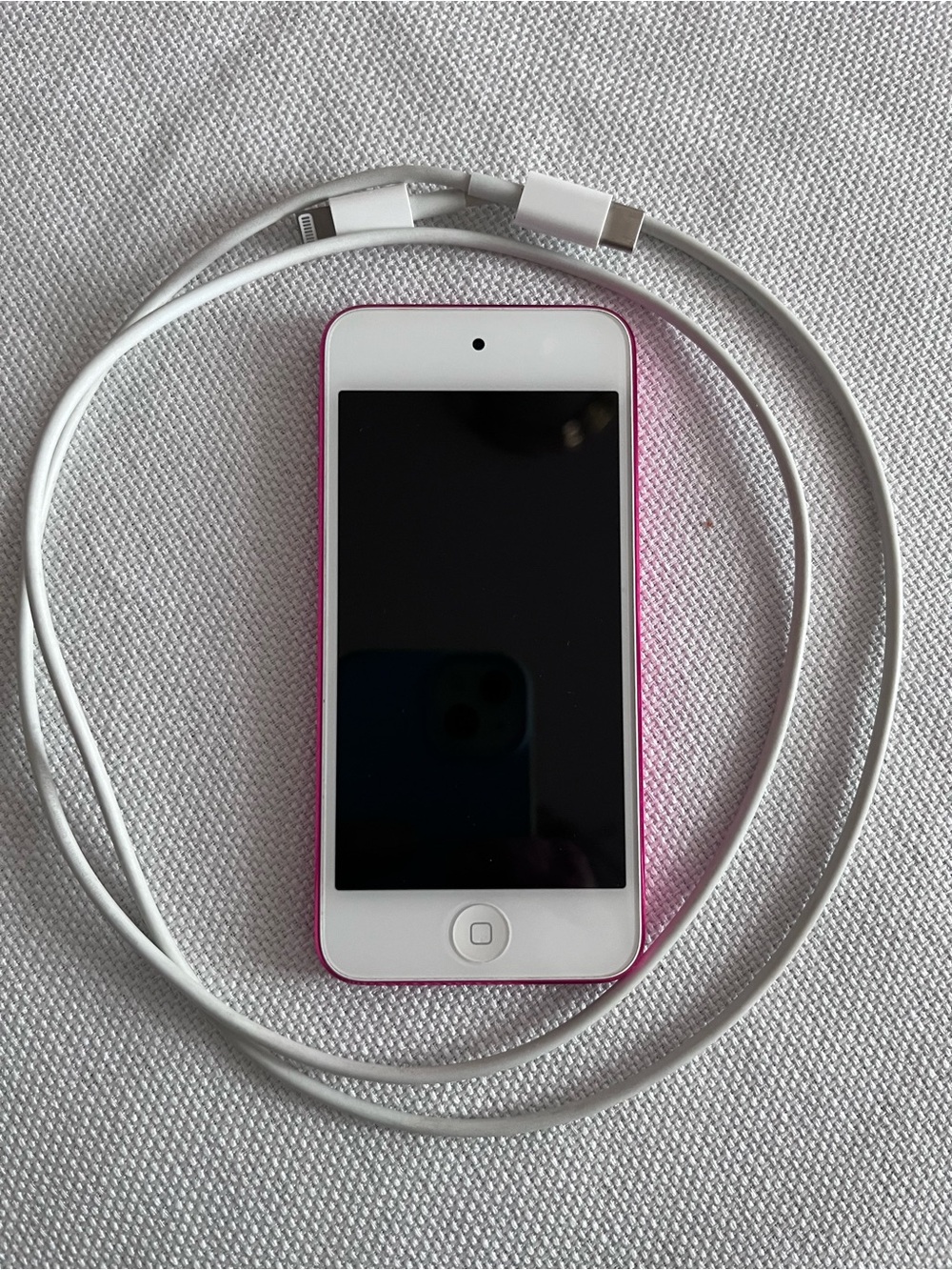 Pink iPod touch with White Front and Charging Cable